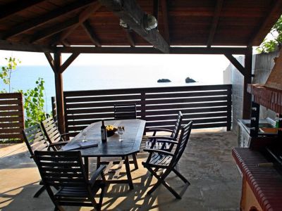 Veranda mit BBQ direkt am Meer Ferienhaus